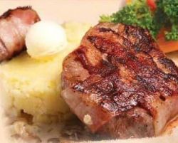 Medallions of veal with mushroom sauce photo